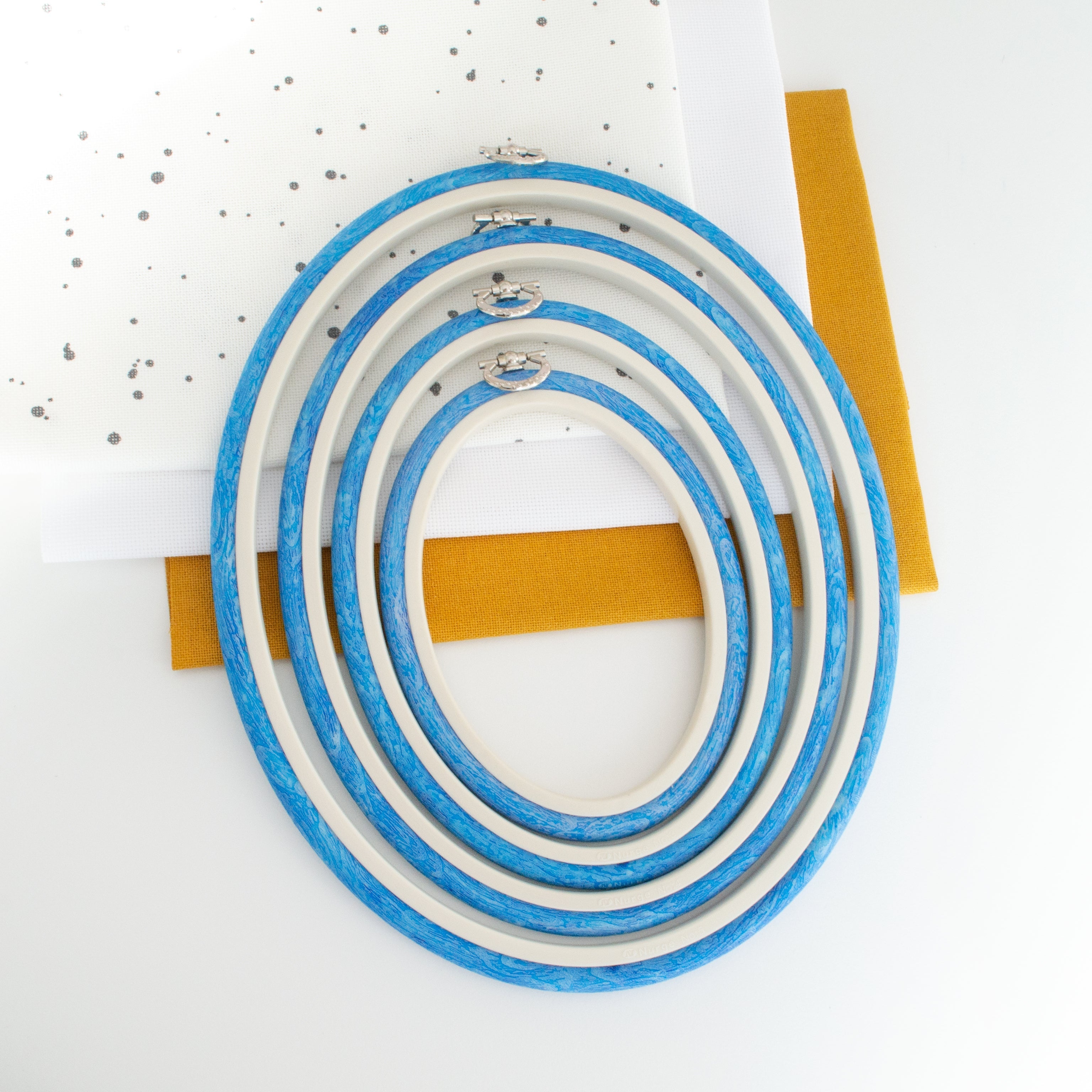Nurge Oval Flexi Hoop Frame (Blue): Enchanting Display for Your Embroidery Projects