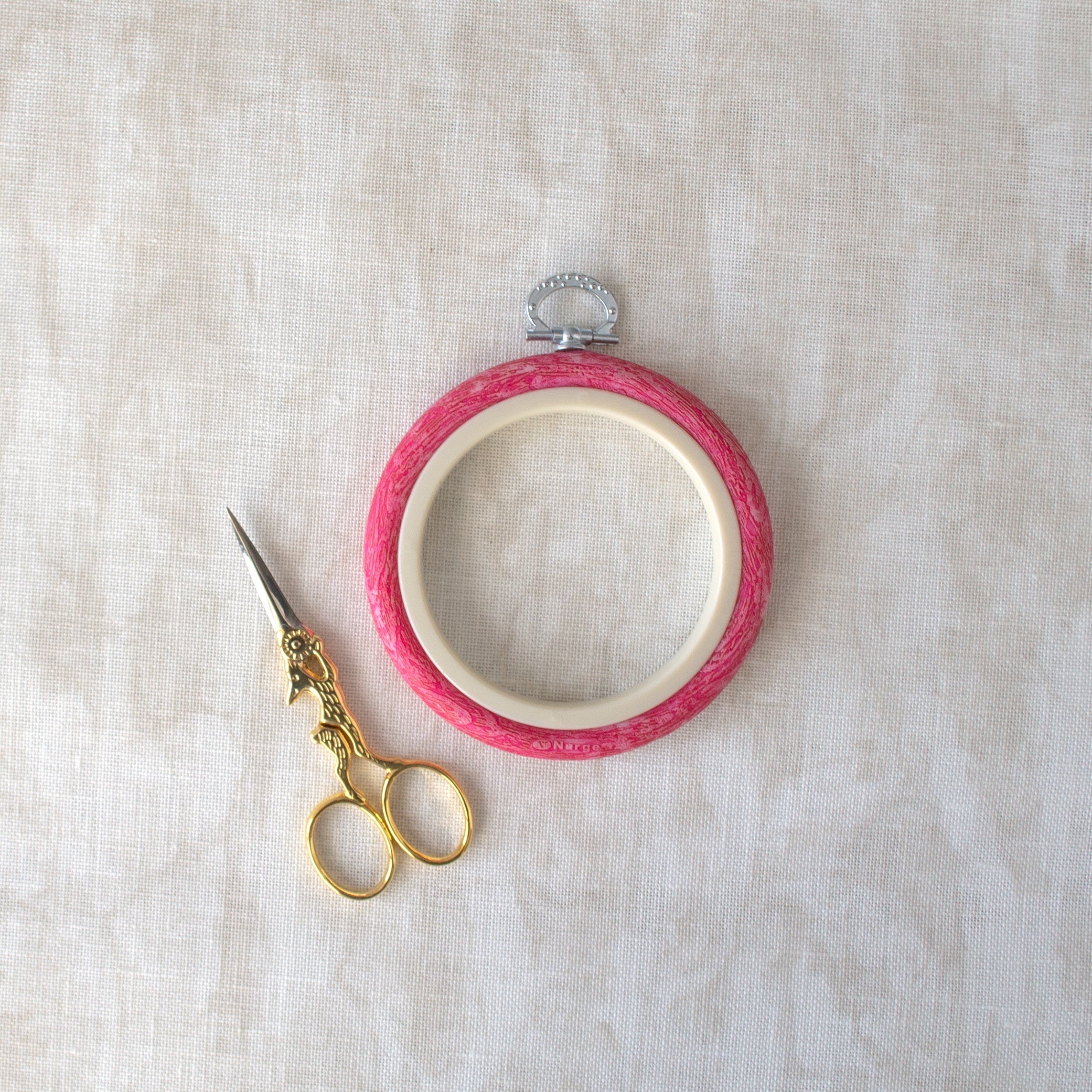Nurge Pink Hoop-Frame: A Delicate Touch for Your Embroidery and Décor