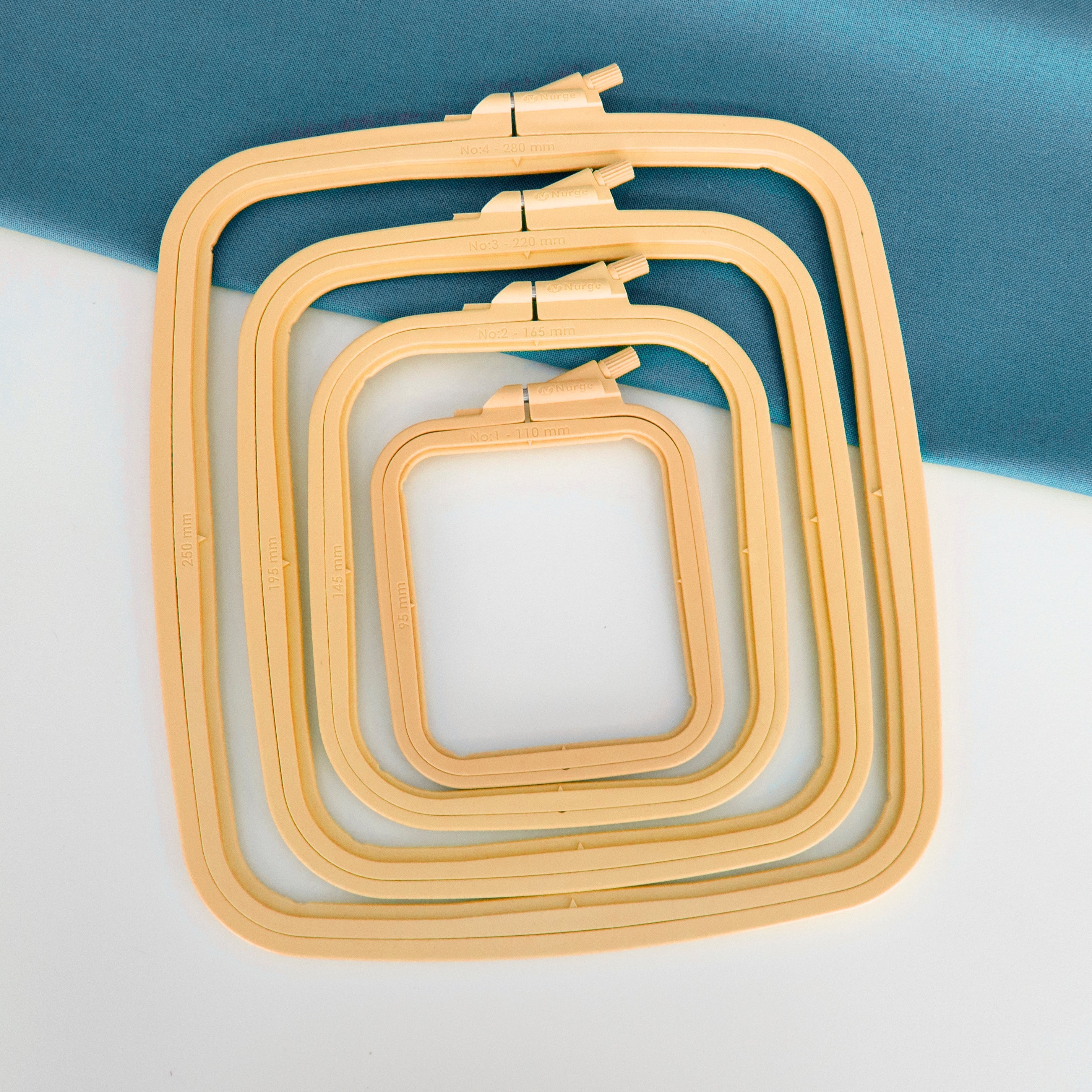 Nurge Beige Square Hoop: Elegance and Precision in Every Stitch