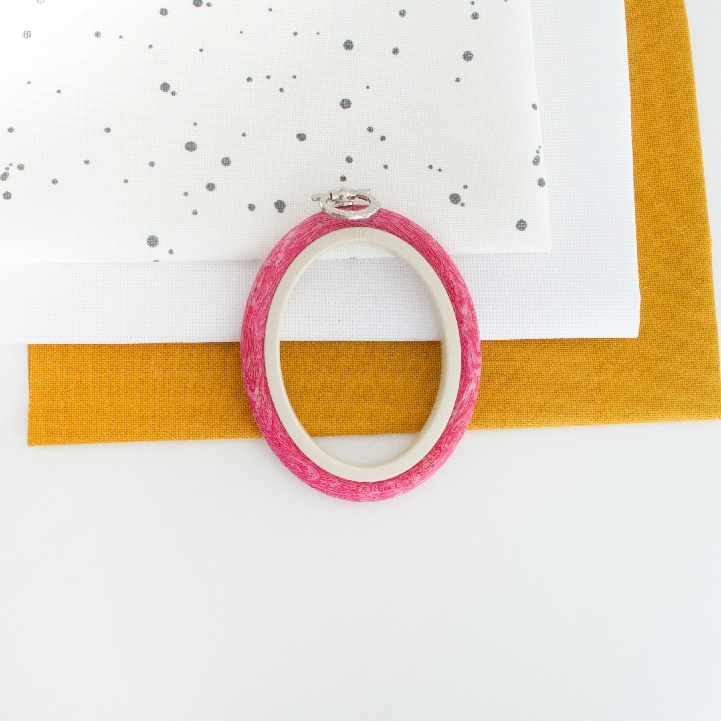 Nurge Oval Flexi Hoop Frame (Pink): Charm and Functionality for Your Needlework
