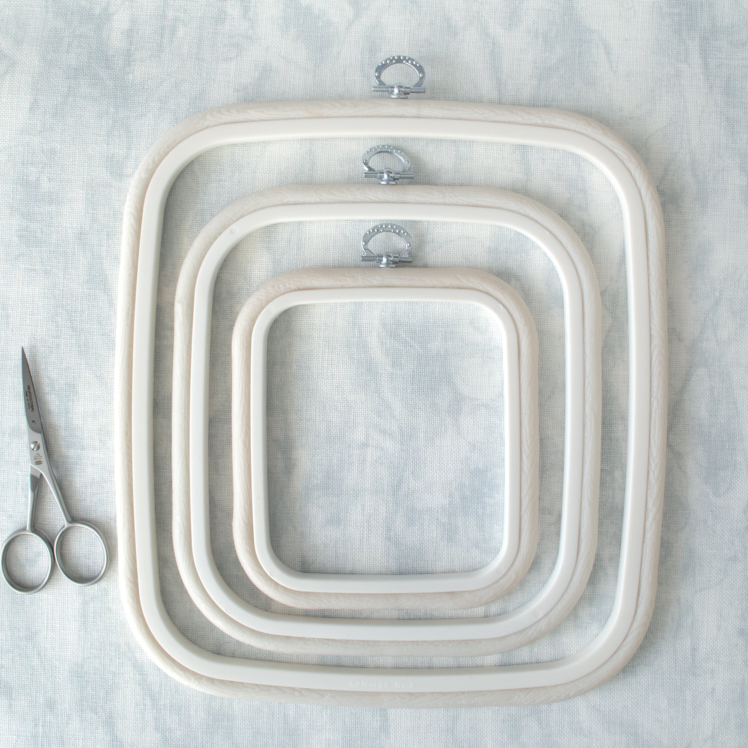 Nurge Square Flexi Hoop Frame in Pristine White: Elegance and Functionality